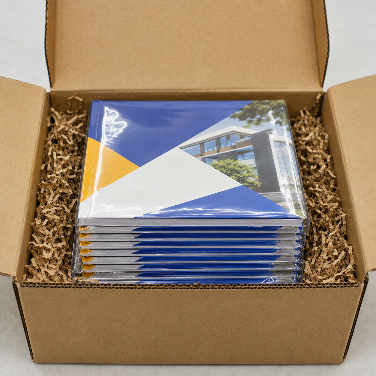 Gloss laminated textbooks securely packed in a recyclable delivery box